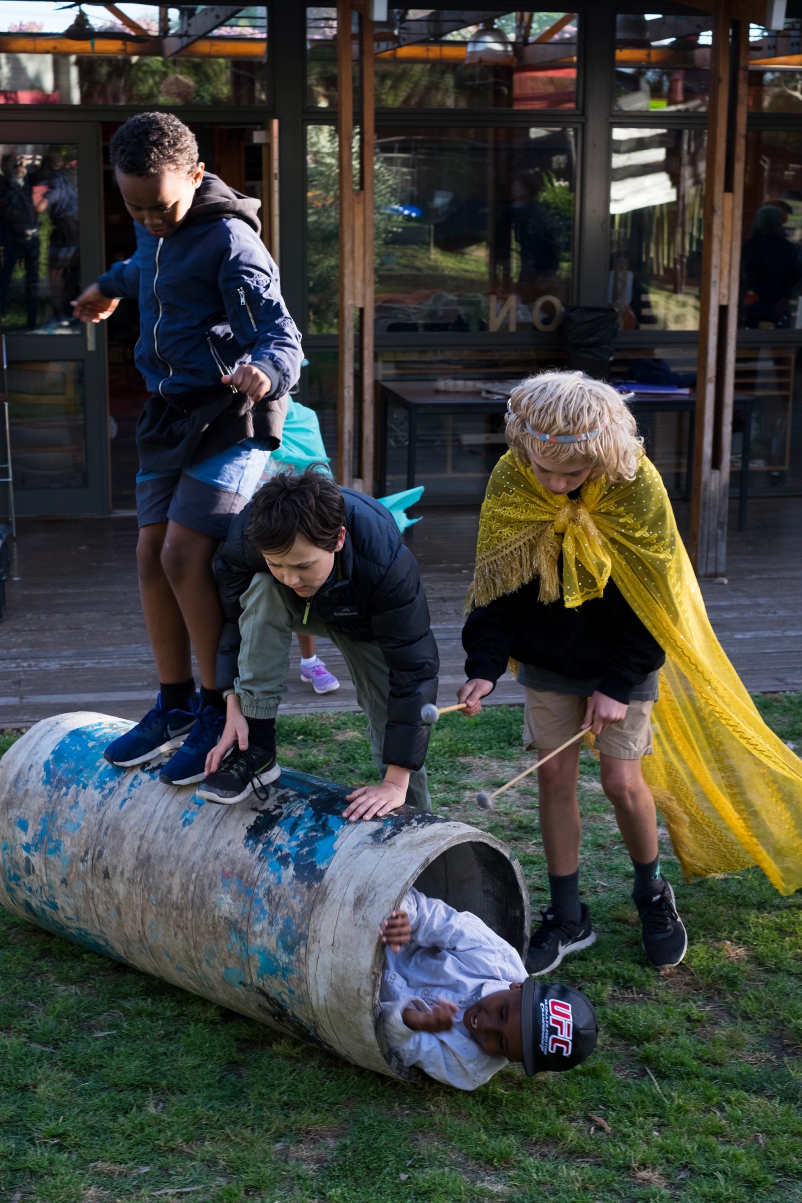 Four children performing one of them in a tube as part of Chamber Made's The Venny Imagine a Place 2017