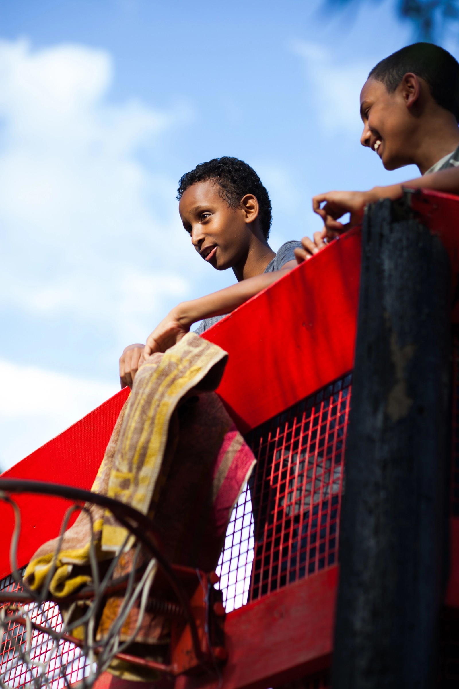 Two children smiling atop a structure as part of The Chamber Made Venny Celebration 2018