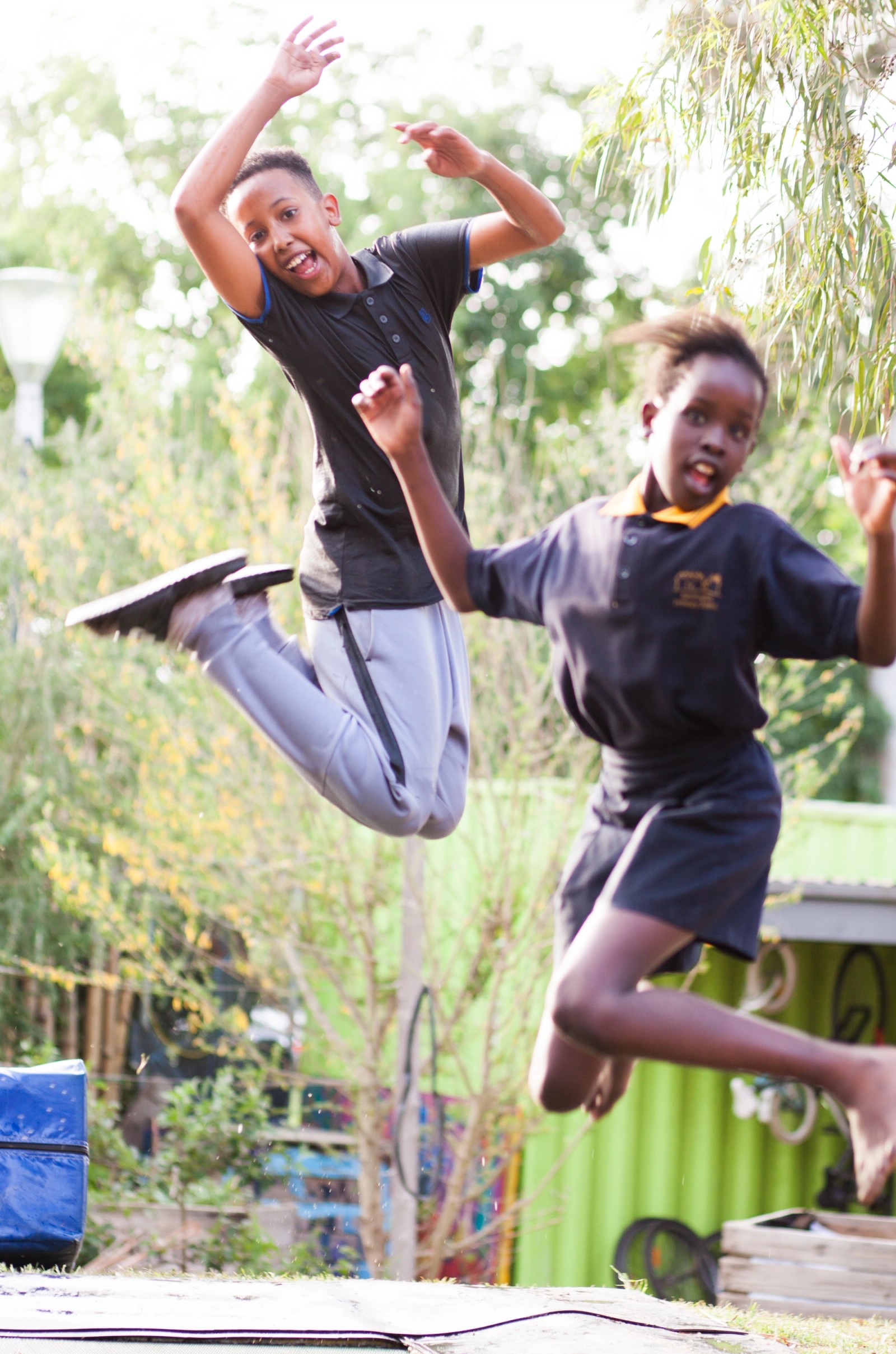 Two children jump in the air as part of The Chamber Made Venny Celebration 2018