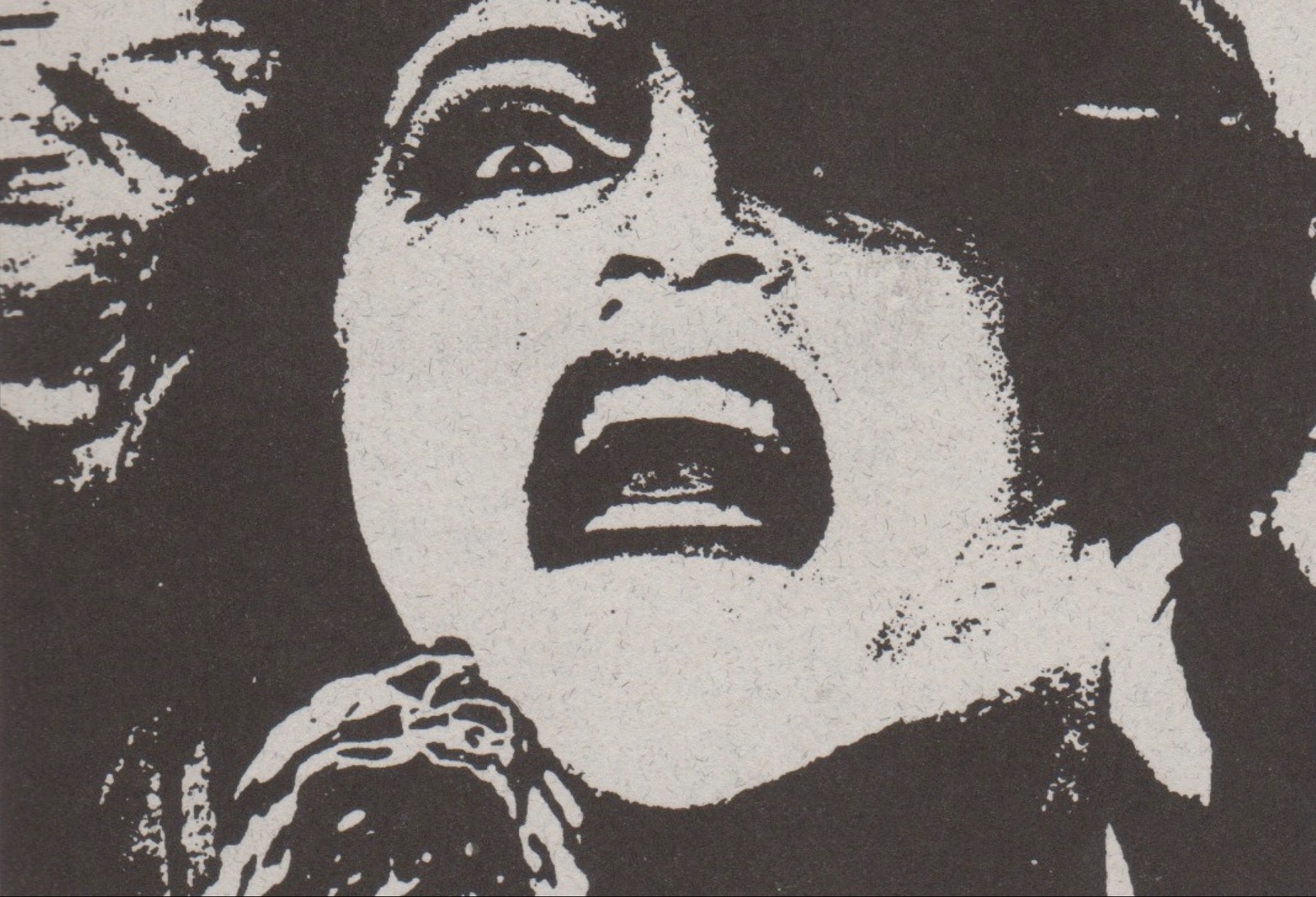 A negative B&W image of a woman in distress