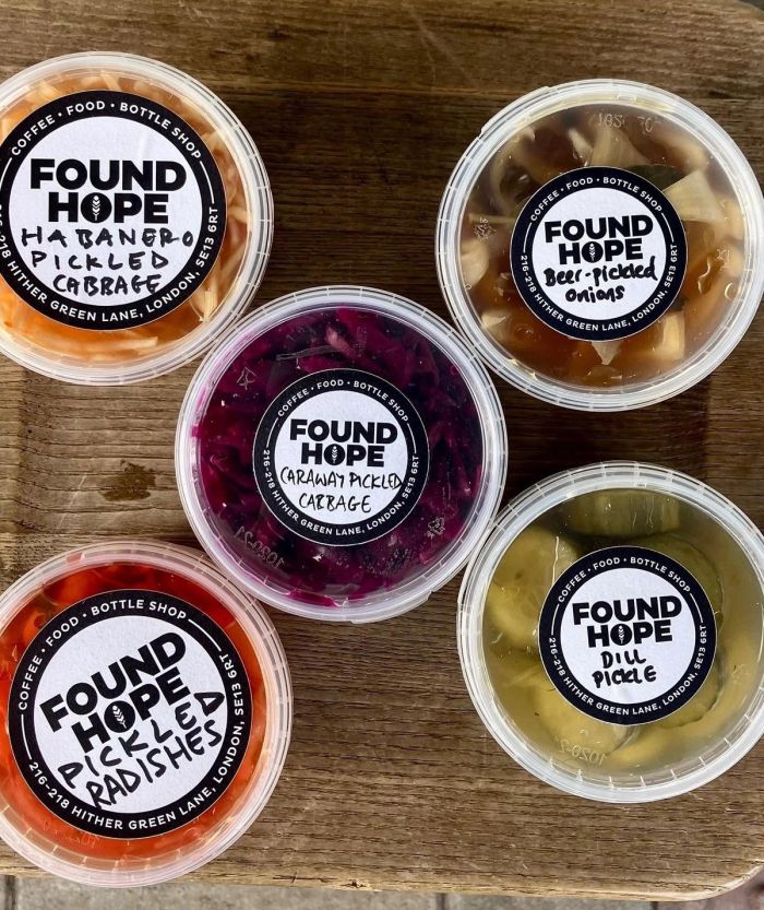 Five tubs of Found Hope pickles with handwritten labels