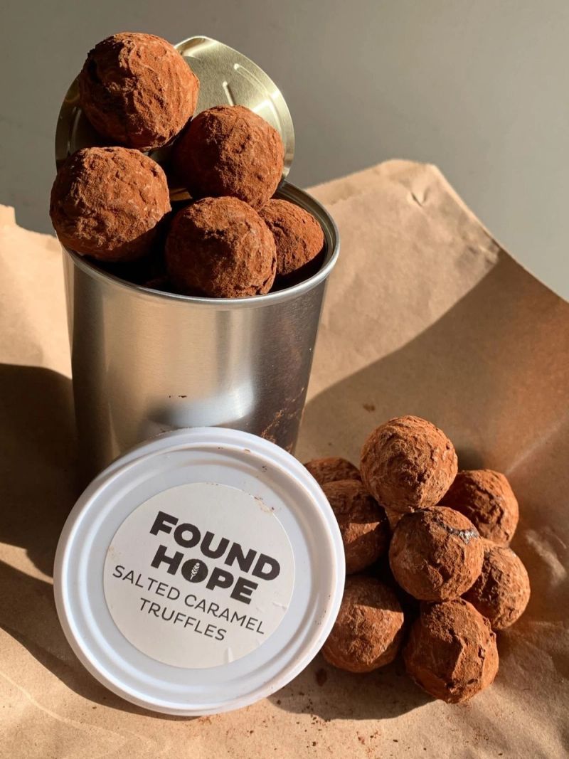 Our salted caramel truffles in a tin