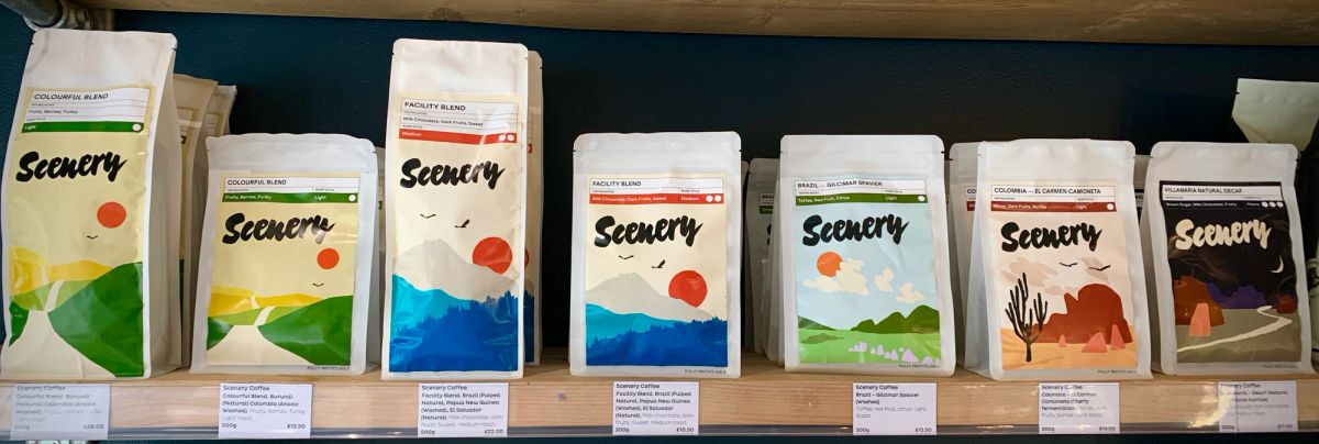 A shelf of Scenery Coffee bags in the shop, from Colourful Blend to Villamaria decaf