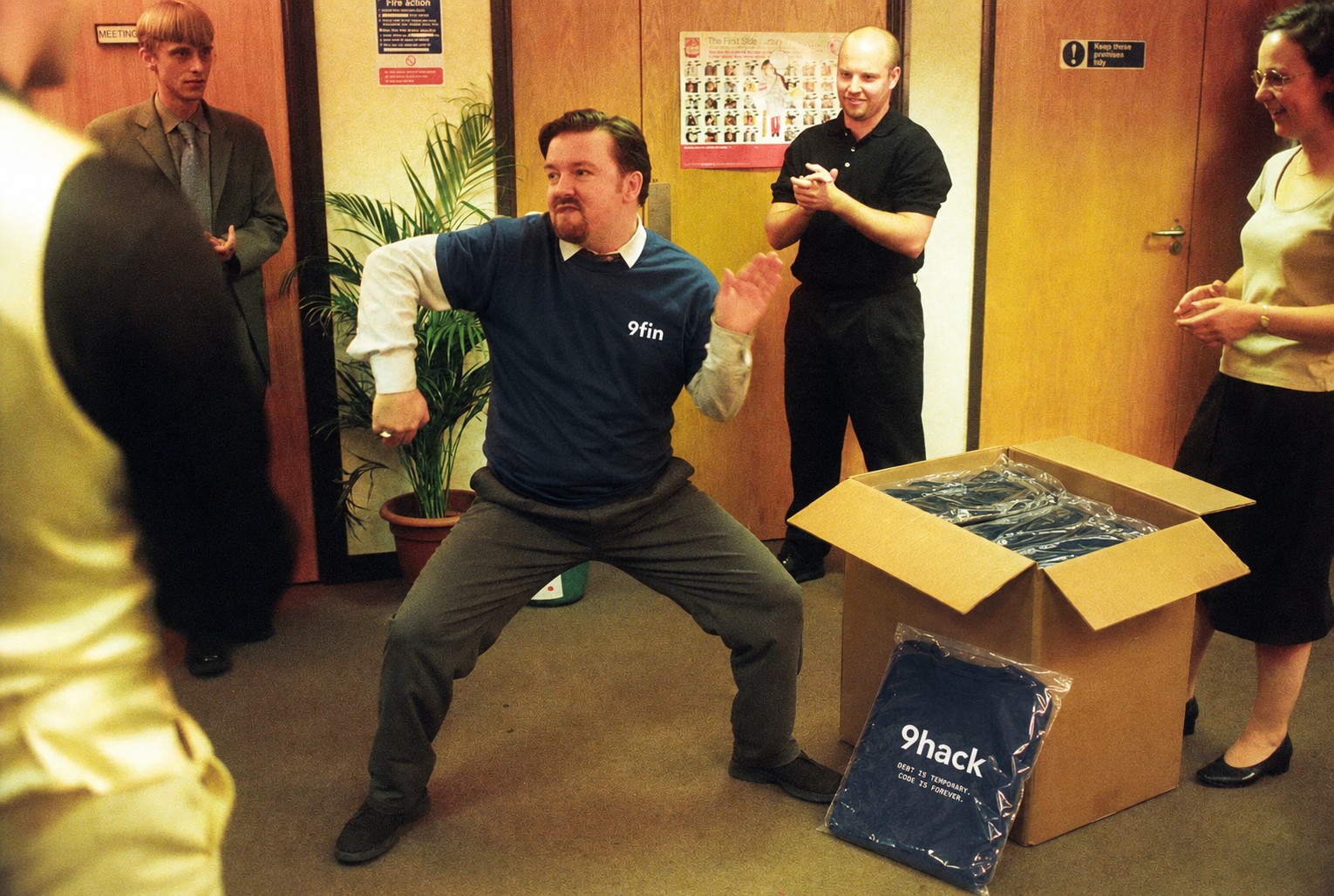 David Brent dancing in a 9fin t-shirt