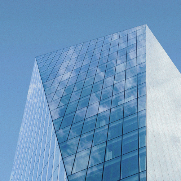 buildings against cloudy sky