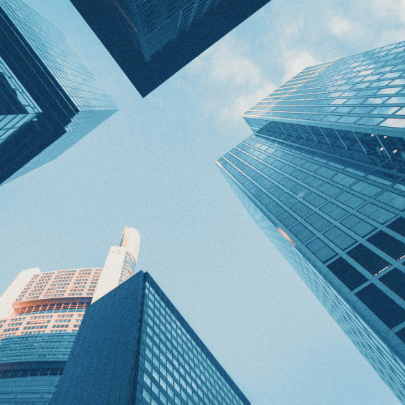 buildings against cloudy sky