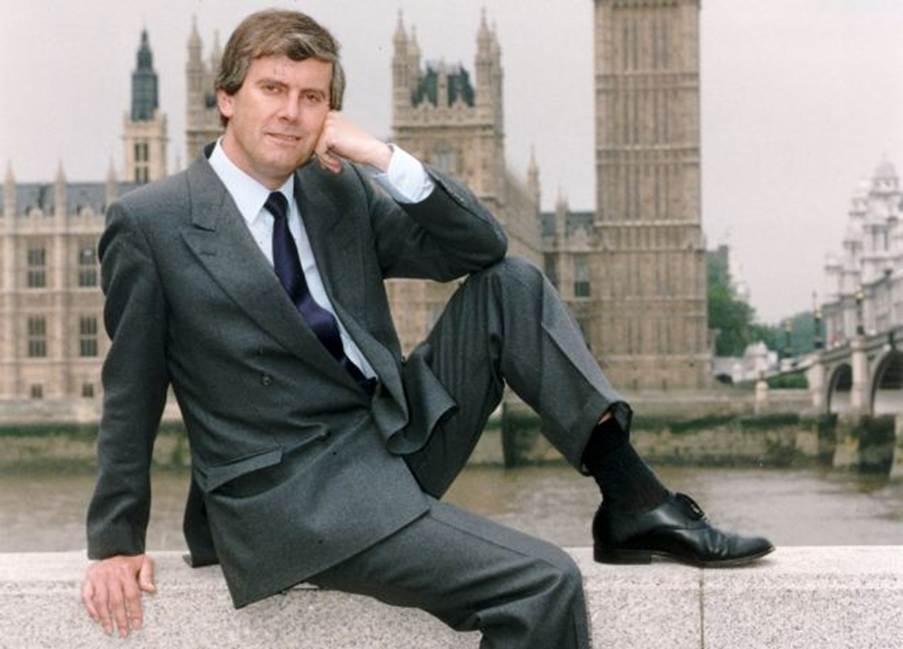 Here he is in a suit, though