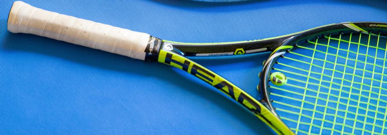 Rackets on a blue court