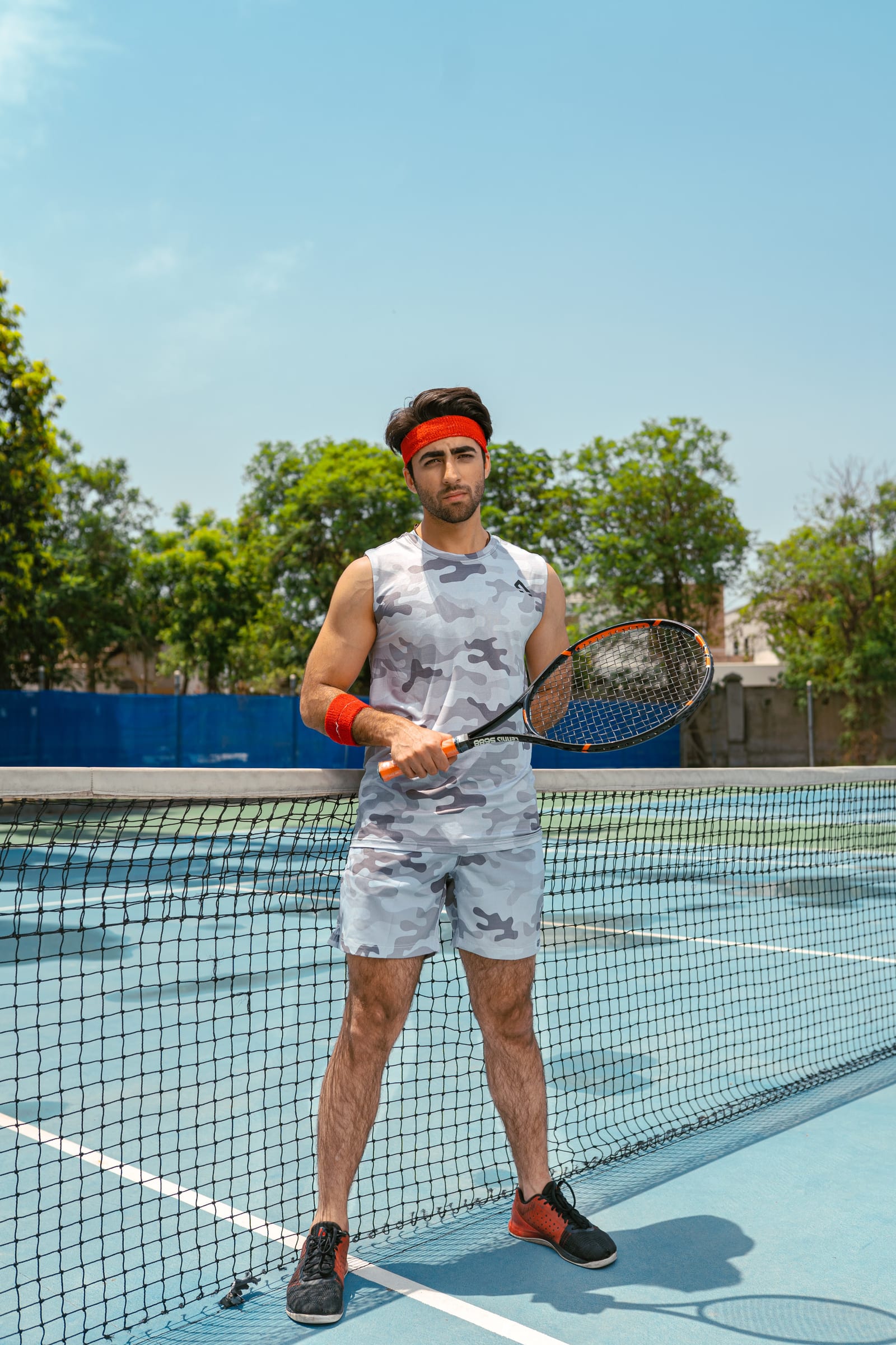 Player in a camo tank at the net