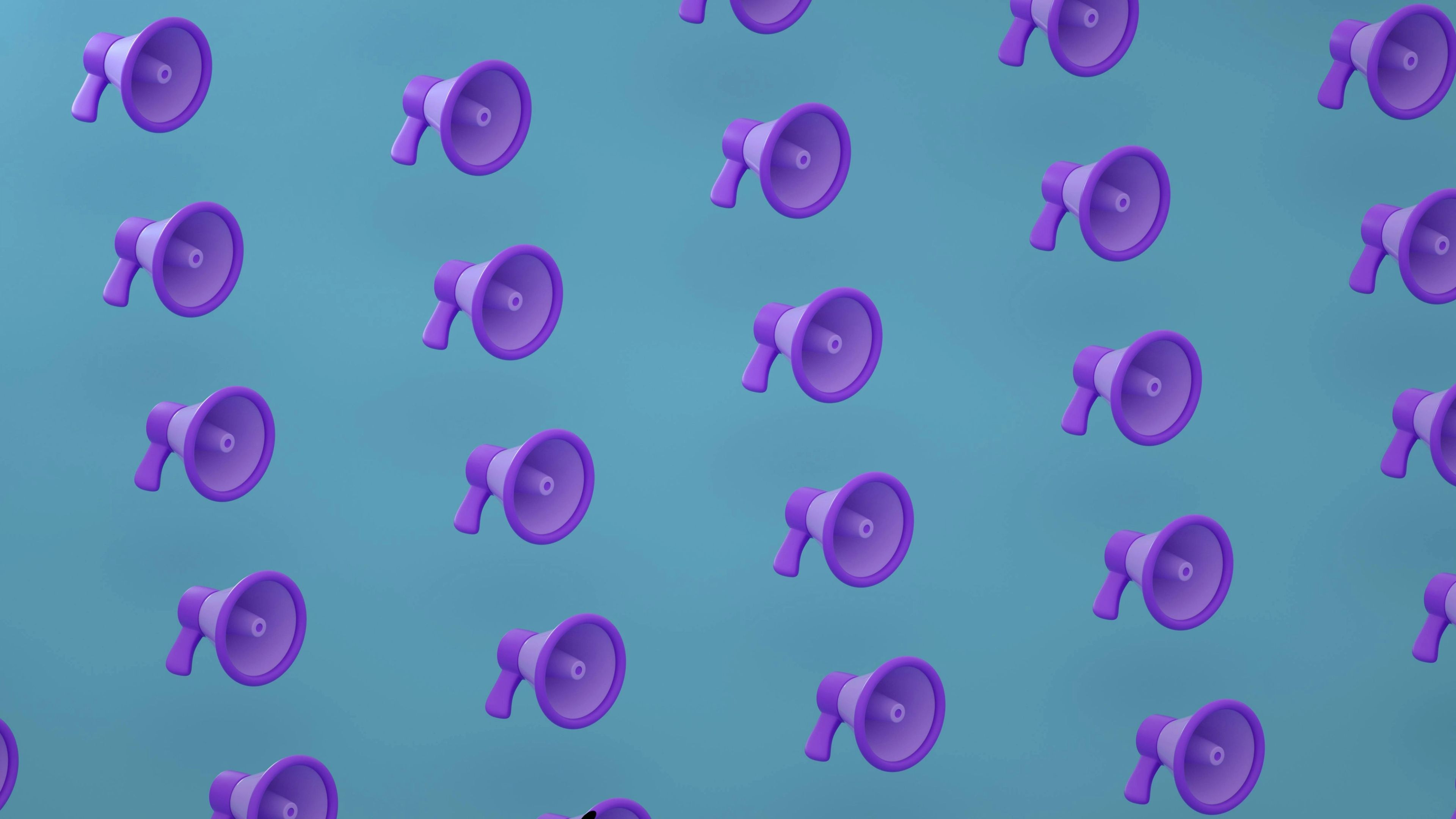 Rows of purple megaphones on a teal background