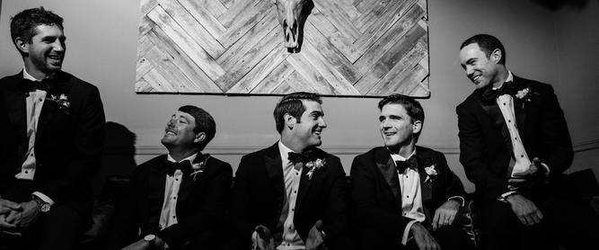 Candid photo of a group of groomsmen