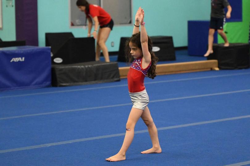 Gymnast ready to do a cartwheel