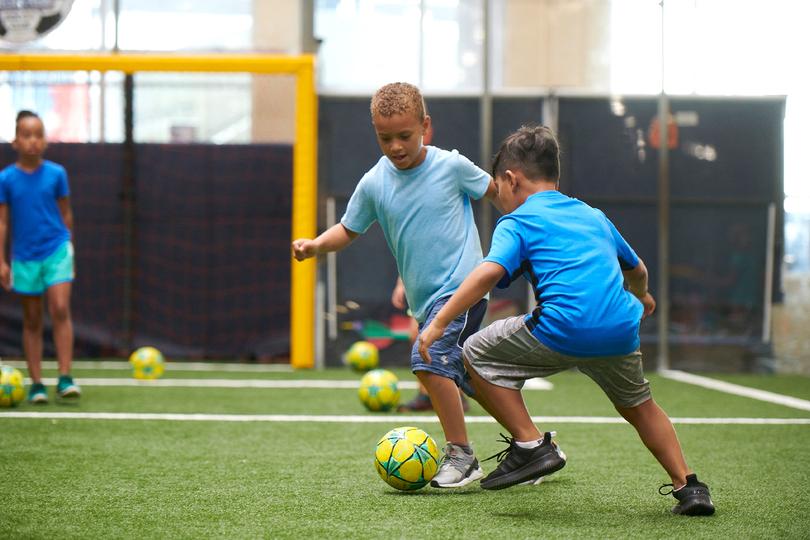 Kids playing soccer