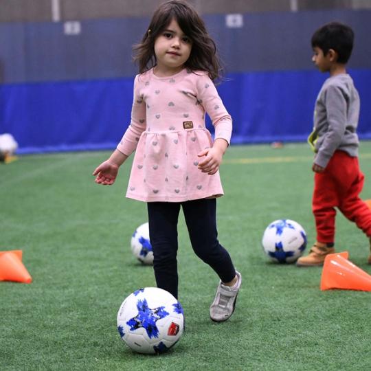 Kid with a soccer