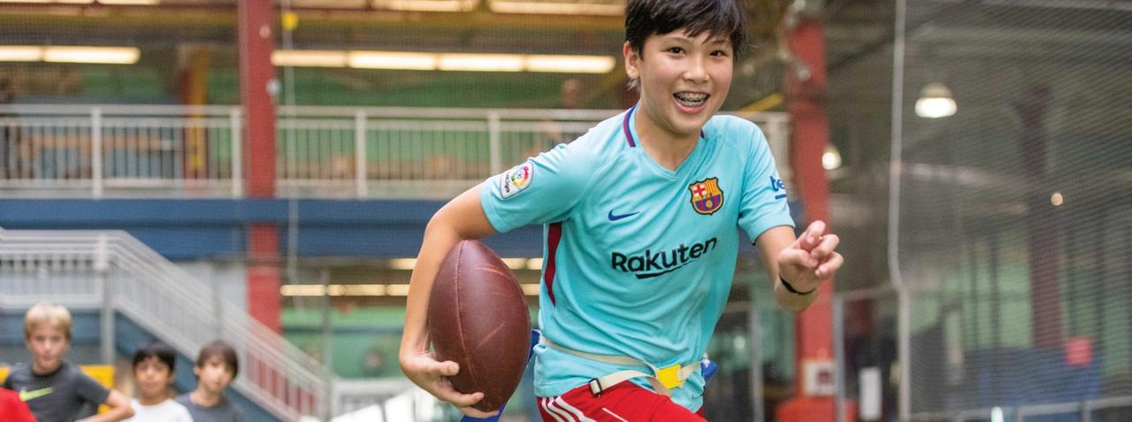 Kid playing football