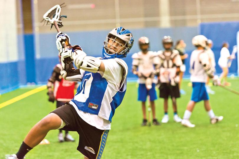 Boys playing lacrosse