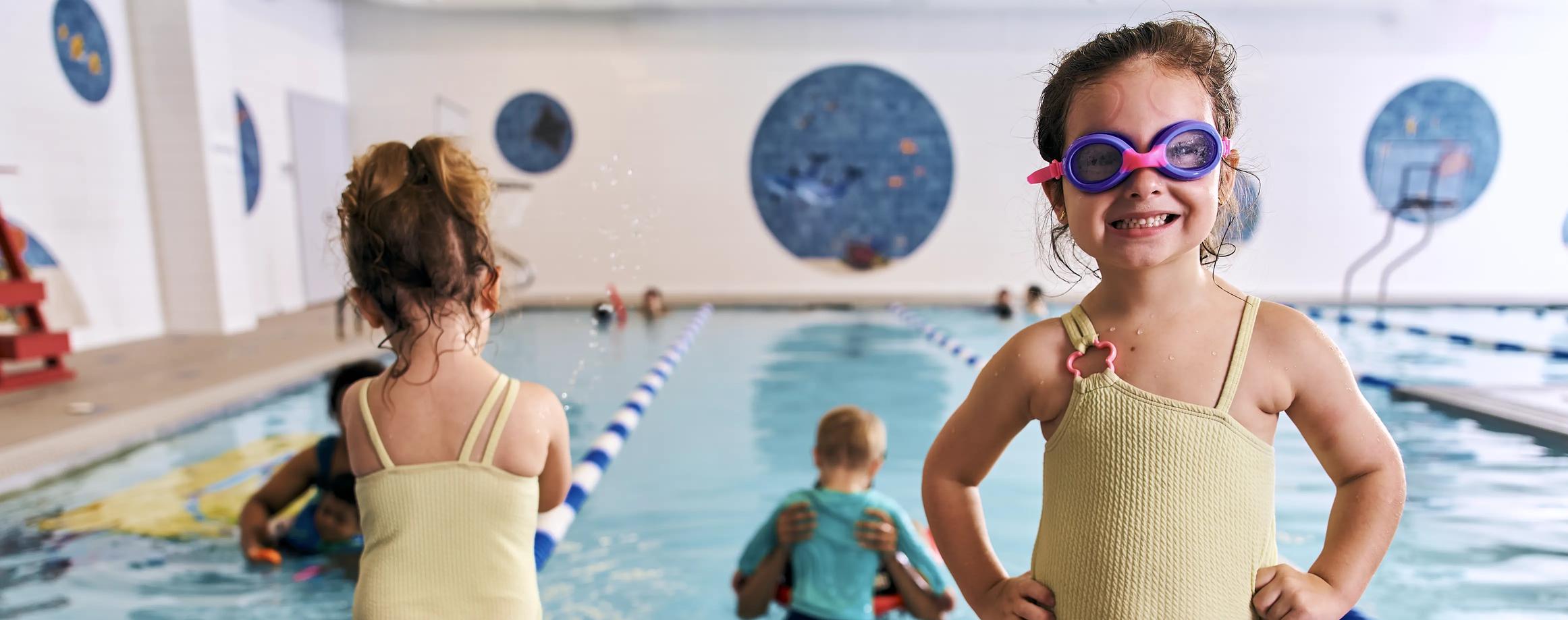 Photo of girl next to swimming pool