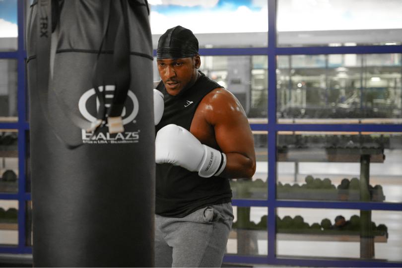 Person hitting boxing bag