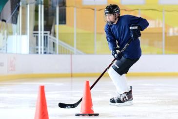 Hockey player practicing