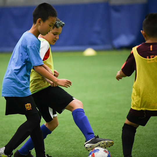 Kids playing soccer