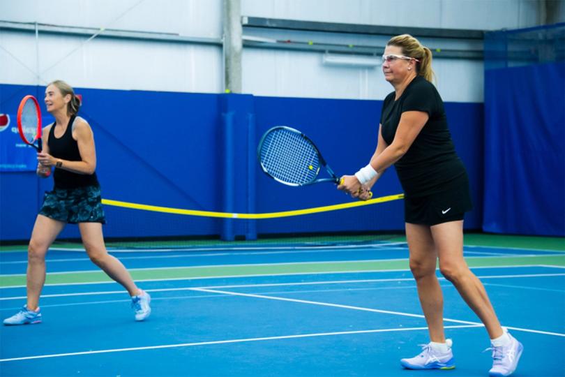 Women playing tennis