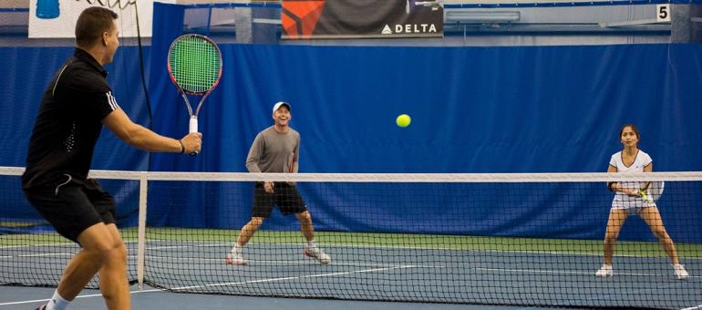Playing tennis at Chelsea Piers Athletic Club in Connecticut