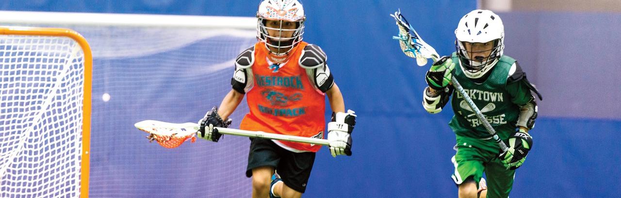 Kids playing lacrosse