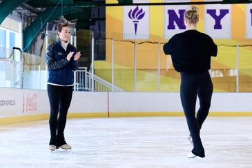 Coach helping a skater