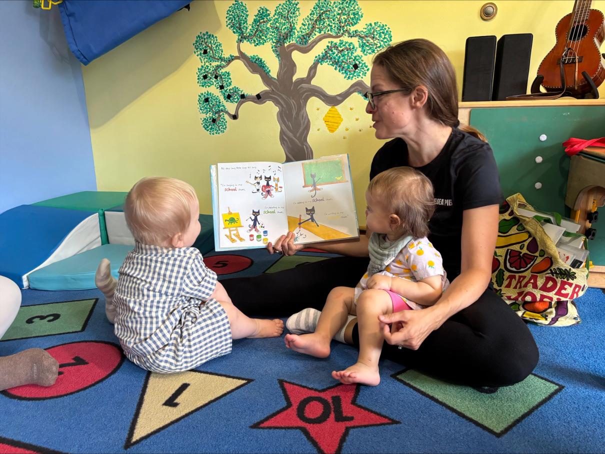 Kids gathering around for reading time