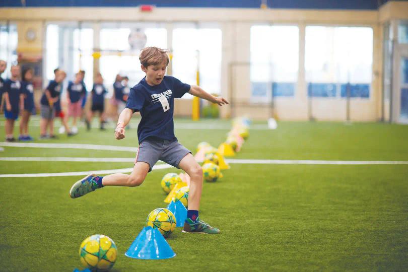 Kid playing soccer