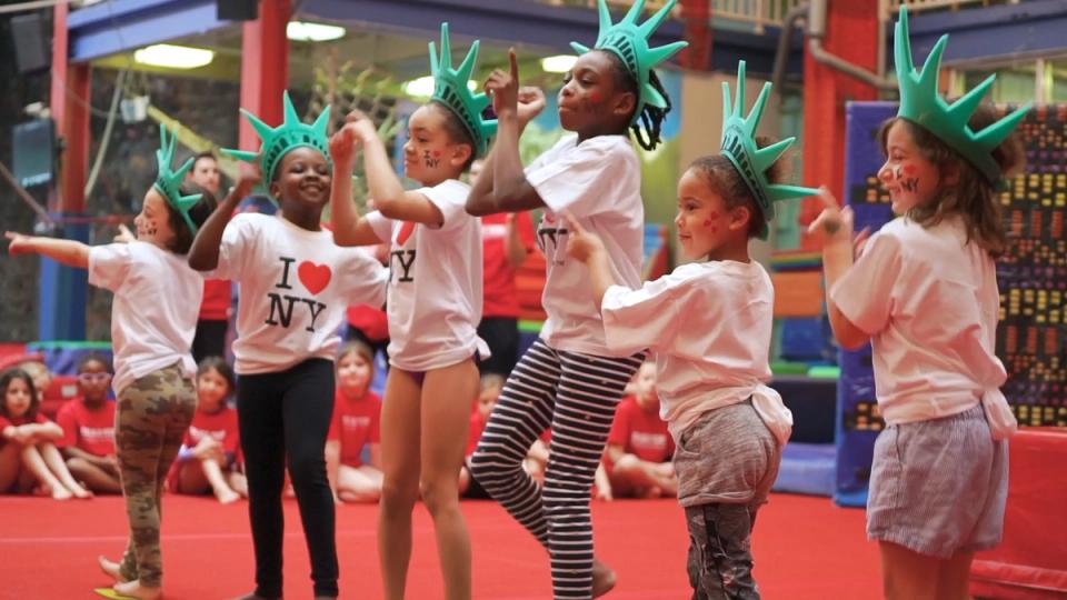 Kids doing a dance at camp