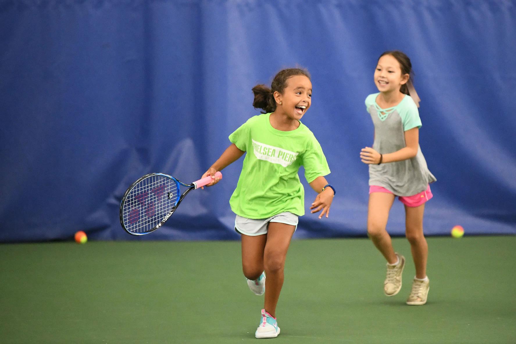 girls running on field