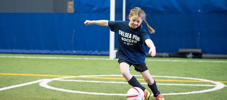 Soccer playing passing soccer ball