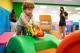 Kid playing with toys
