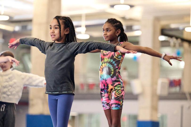 Gymnasts practicing their balance