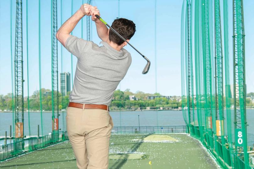 Golfer hitting a ball