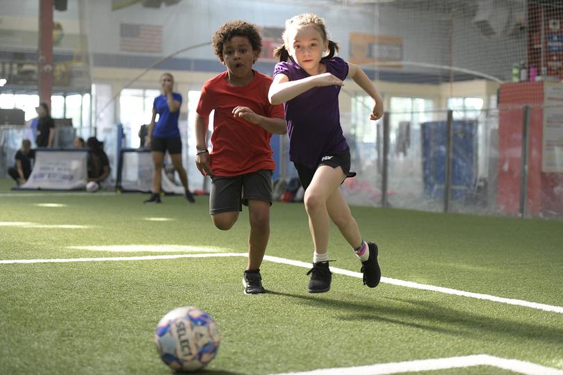 Kids playing soccer