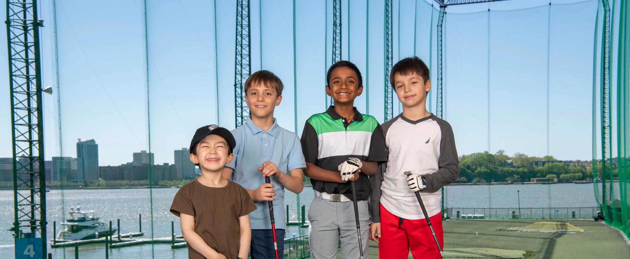 Kids learning to play golf