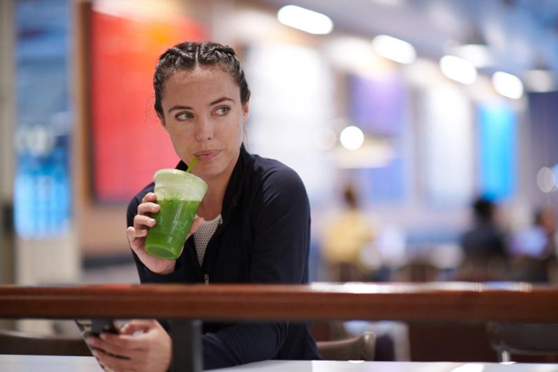 Girl drinking a juice at Juicy