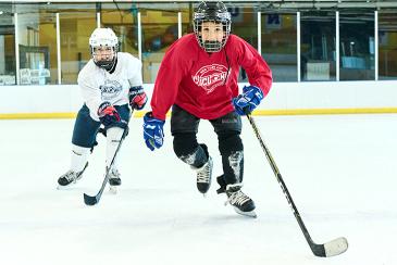 Kid playing hockey