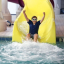 Kid sliding down waterslide