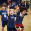 Kids cheering on the court