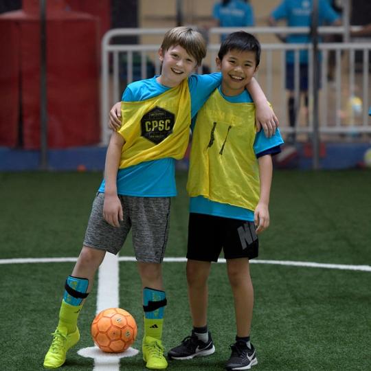 Kids playing soccer