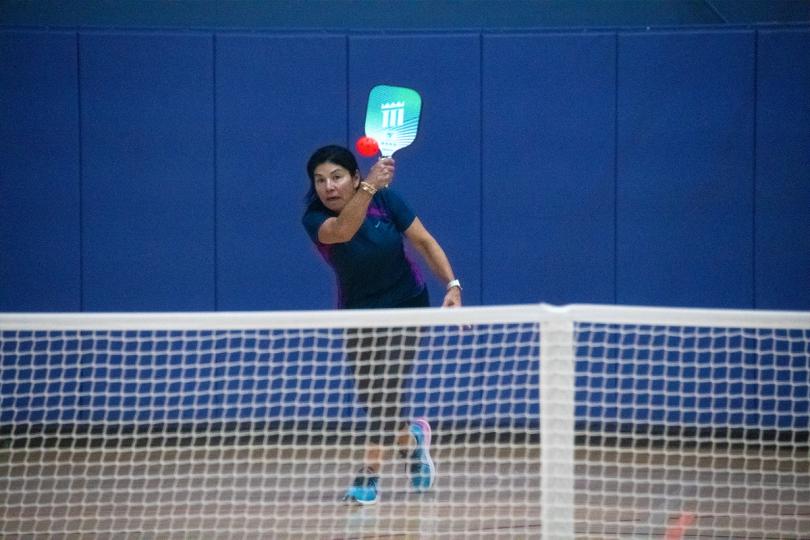Woman playing pickleball