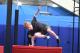 Kid jumping over a mat
