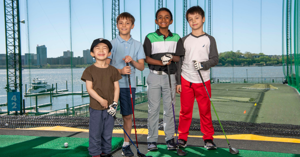 Kids playing golf