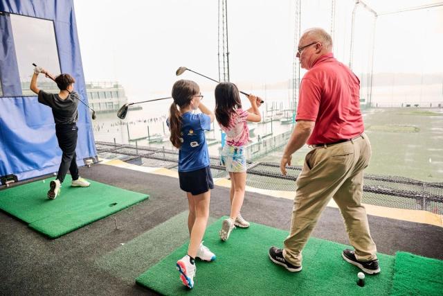 Kids playing golf