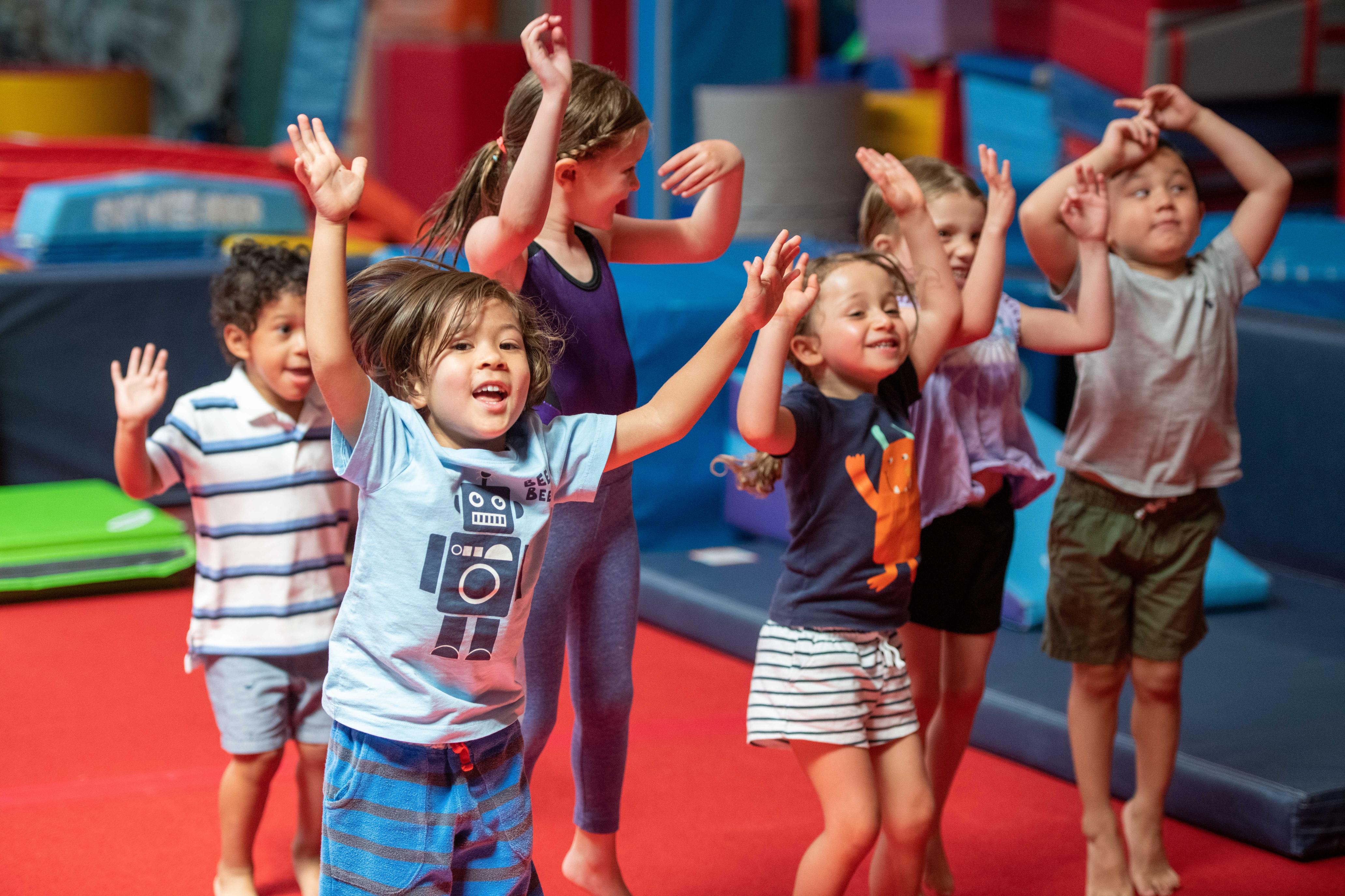 Kids cheering at camp