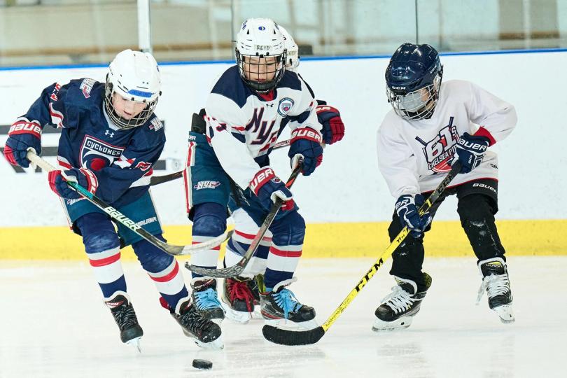 Kids playing hockey