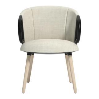 Eggshell armchair with black armrests and light colored wood legs
